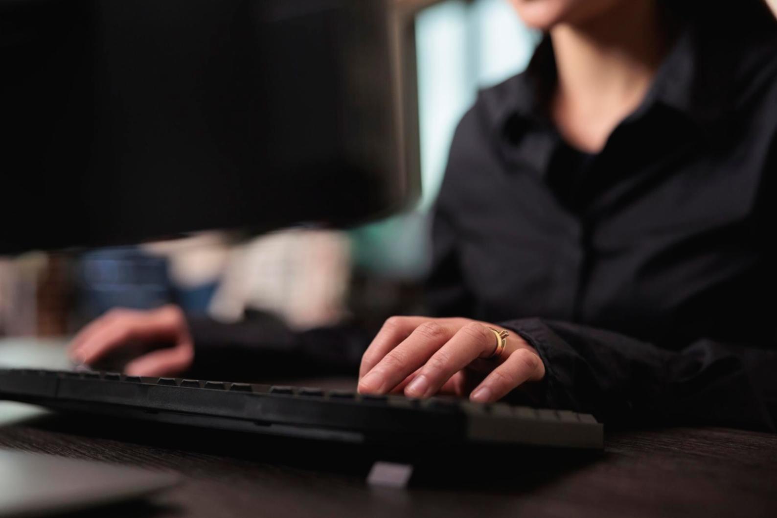 Instructor reviewing API documentation and test cases during curriculum development session